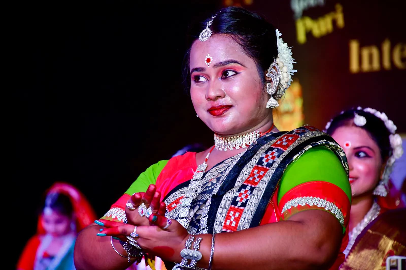 Itishree Pattnaik in performance, hands held in a mudra